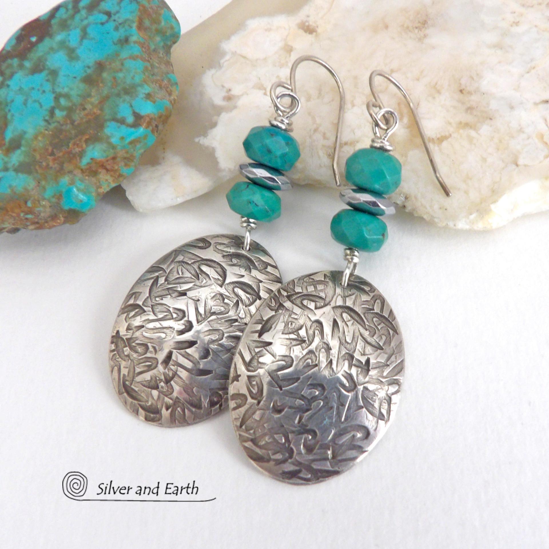 Handcrafted earrings with sterling silver oval dangles with a hand stamped texture accented with natural turquoise and hematite gemstones. The stones have a faceted finish which casts off a natural sparkle and shine. They have a modern style with southwestern flair that looks great with all wardrobe types. Perfect for women that love modern style southwest jewelry. Handmade in the USA by Silver and Earth Jewelry, a New Mexico True Certified business.