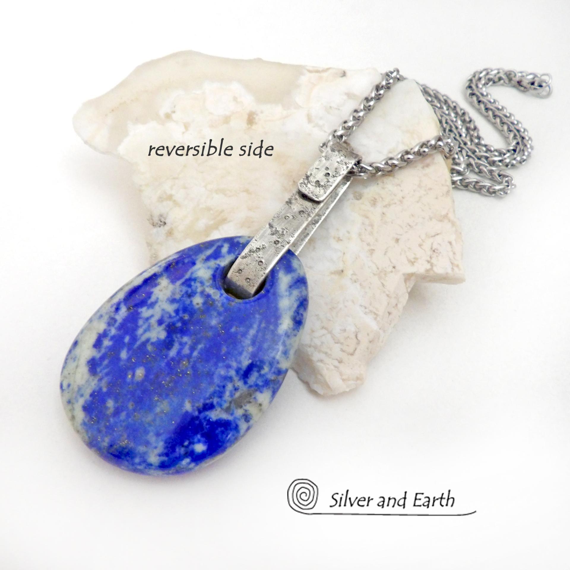 This one-of-a-kind necklace features a gorgeous, natural lapis lazuli gemstone accented with a handcrafted sterling silver bail with a lightly hammered organic texture. The stone is a beautiful shade of blue with white inclusions, along with a sprinkling of natural sparkly pyrite inclusions. The stone is equally gorgeous on both sides, so I designed it to be reversible. (See all photos for alternate sides). Makes a great gift for a natural stone lover - or a nice addition to your own jewelry wardrobe.