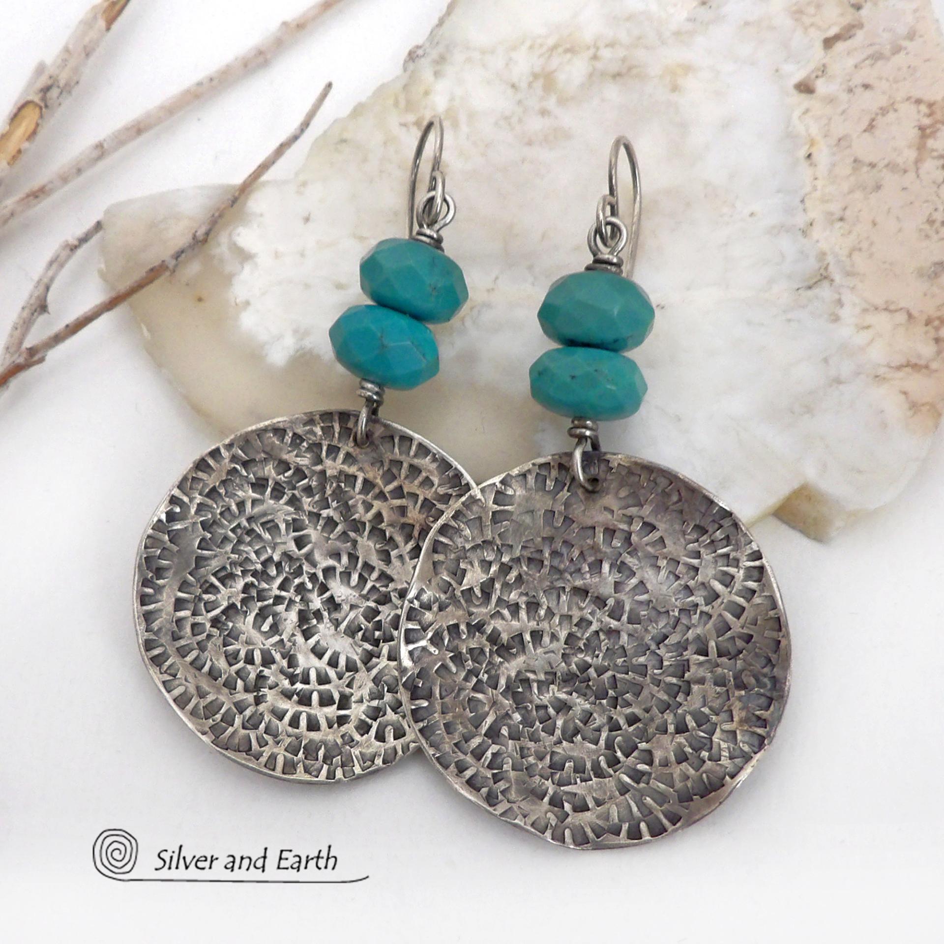 These handcrafted earrings feature large sterling silver round dangles with a hand stamped texture accented with natural turquoise gemstones with a faceted finish. Big and bold, they have a modern style with southwestern flair that looks great with all wardrobe types. Perfect for women that love large earrings and bold statement jewelry. Handmade in the USA by Silver and Earth Jewelry, a New Mexico True Certified business.