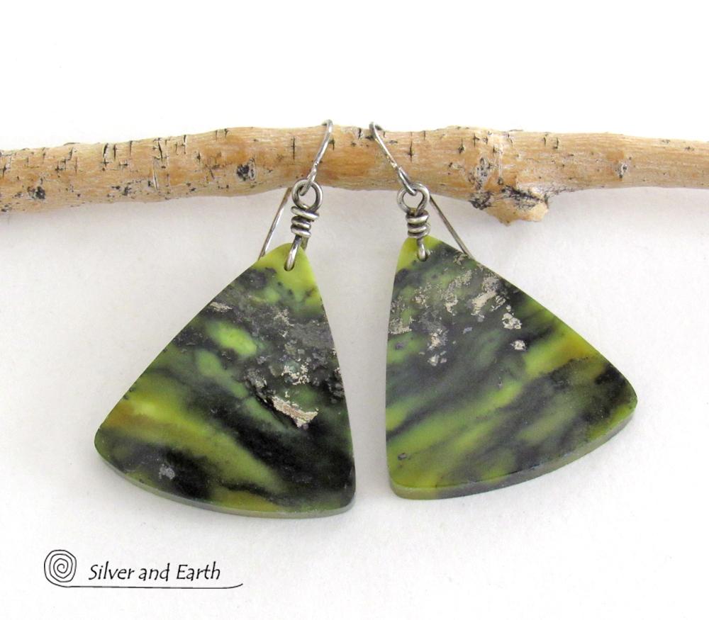 These one-of-a-kind earrings feature gorgeous slices of natural serpentine gemstones in hues of green and black, along with a sprinkling of sparkly pyrite inclusions. They have an earthy, modern style that looks great with all wardrobe types. Makes a great gift for a natural stone lover - or a nice addition to your own jewelry collection.