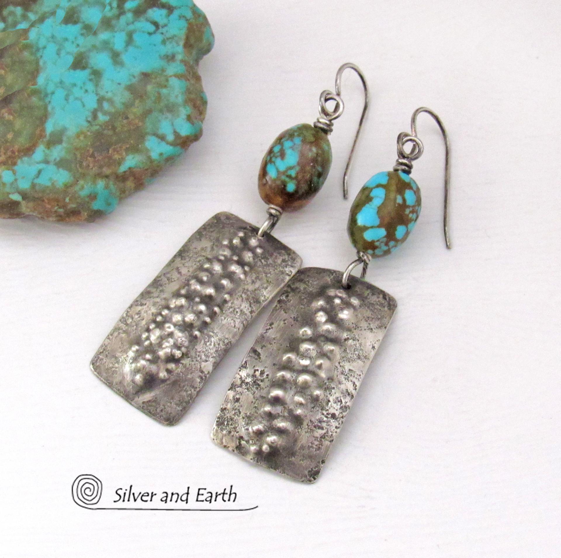 These handcrafted sterling silver earrings have a rustic, hammered and bumpy texture and are accented with natural turquoise stone nuggets.They have an earthy organic style with a modern, edgy flair that makes a bold statement.