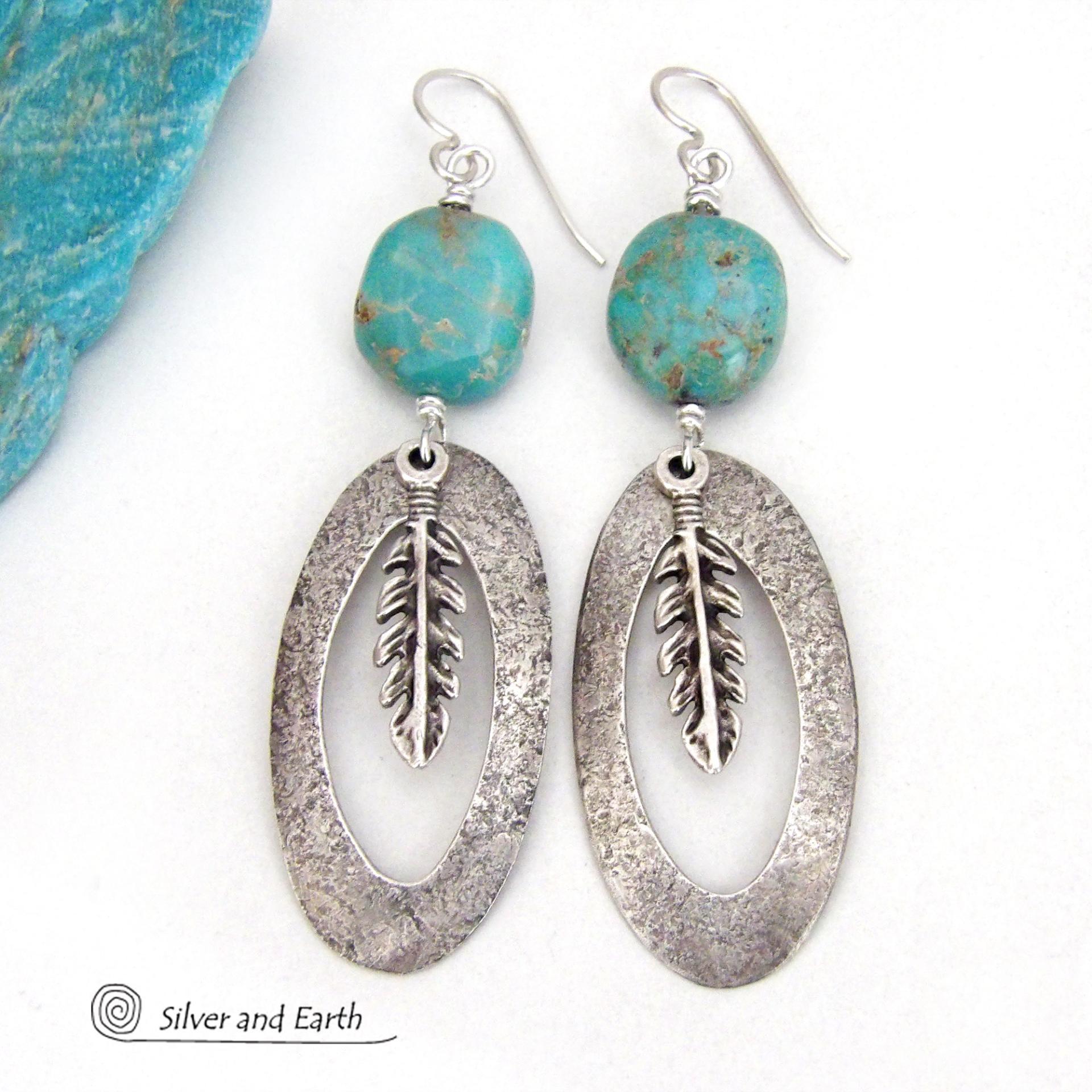 These handcrafted long oval sterling silver hoop earrings are accented with natural turquoise nuggets and dangling pewter feathers. They have a modern southwestern vibe and are perfect for anyone that loves the southwest style. 