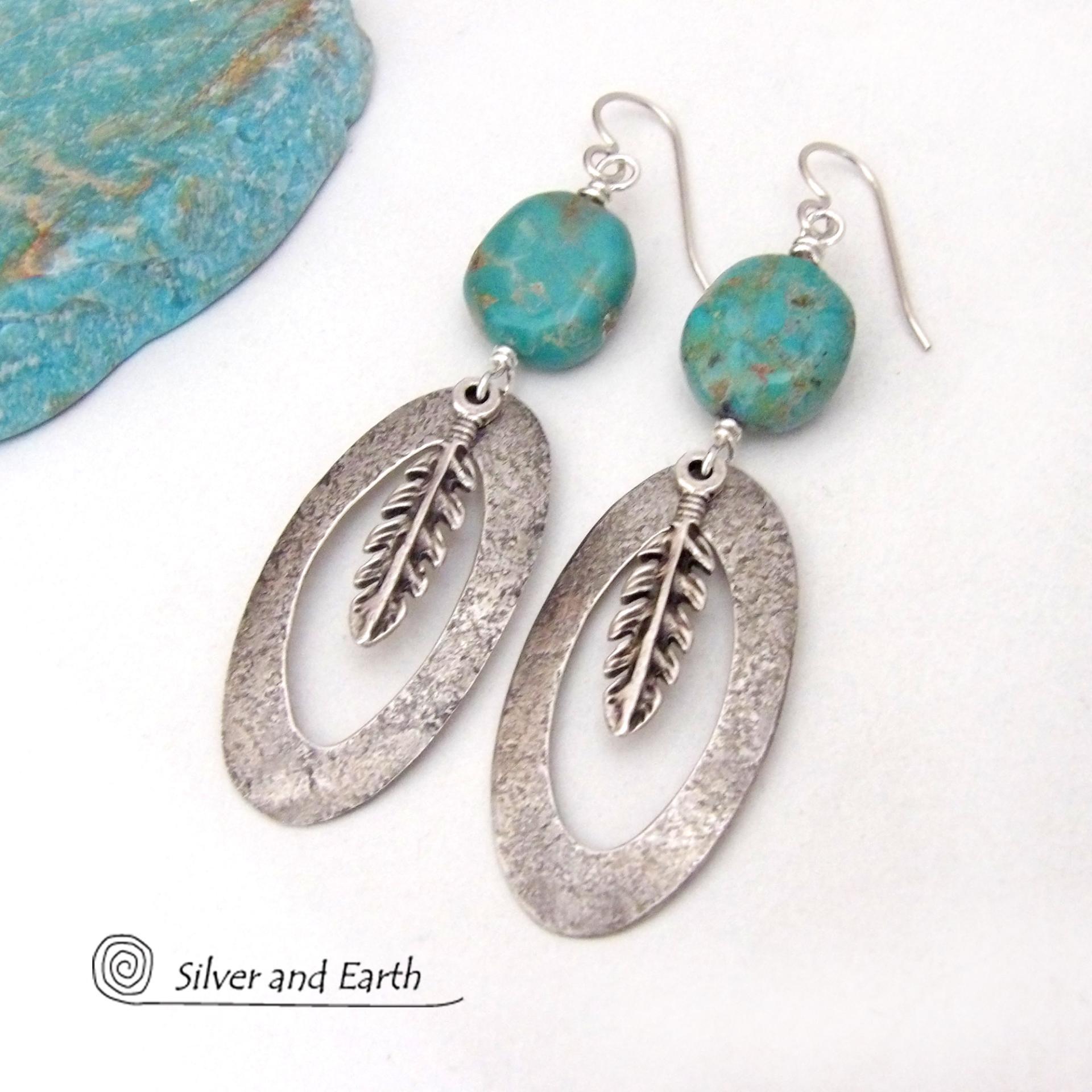 These handcrafted long oval sterling silver hoop earrings are accented with natural turquoise nuggets and dangling pewter feathers. They have a modern southwestern vibe and are perfect for anyone that loves the southwest style. 