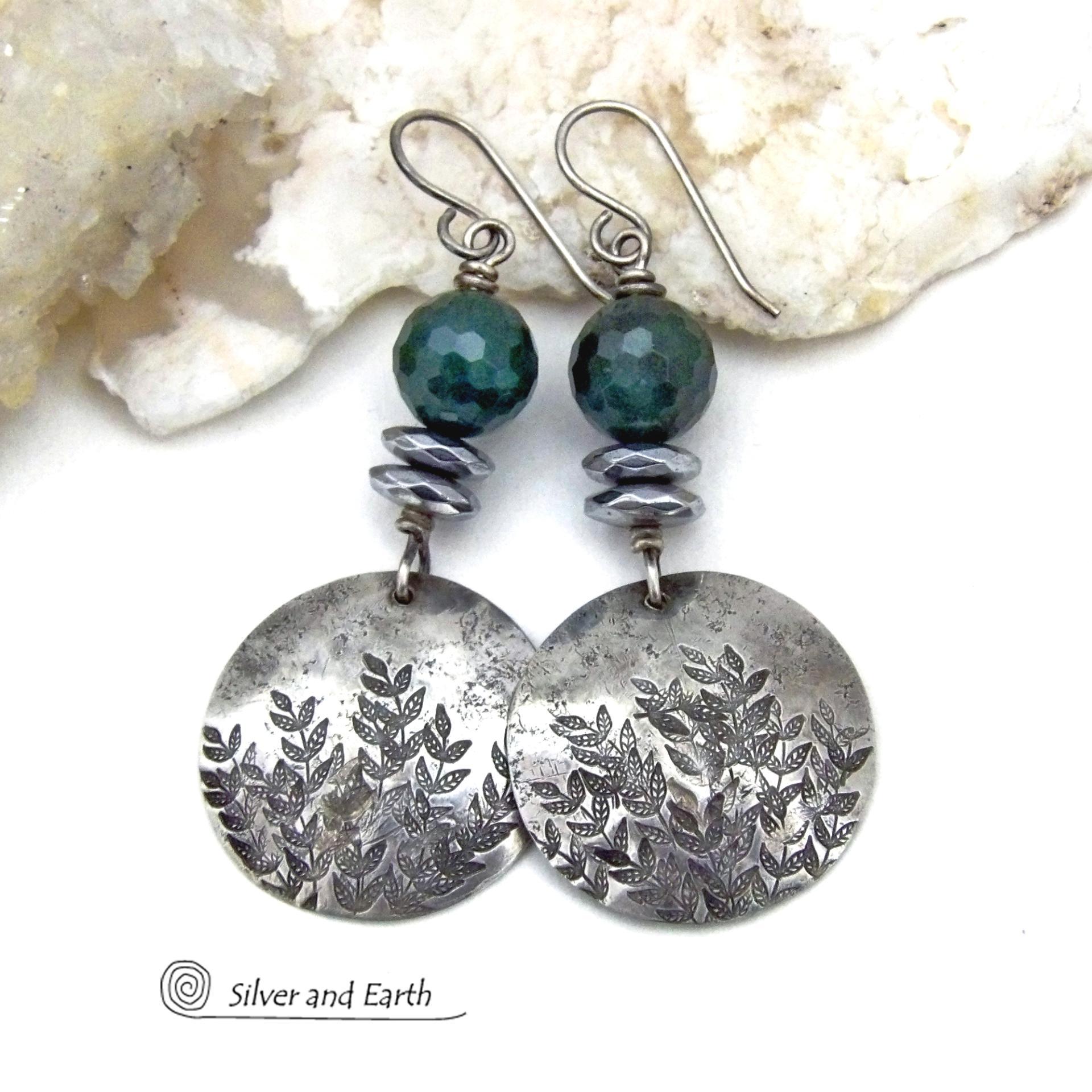These handcrafted sterling silver earrings feature a hand stamped leaf design and are accented with dark green moss agate gemstones. The stones have a micro-faceted finish which gives off a natural sparkle and shine. I accented them with faceted silver hematite gemstones which also give off a natural sparkle. These earrings have a modern chic and elegant style that coordinates beautifully with all wardrobe types. They'll make a great gift for a nature lover - or a nice addition to your own jewelry wardrobe.