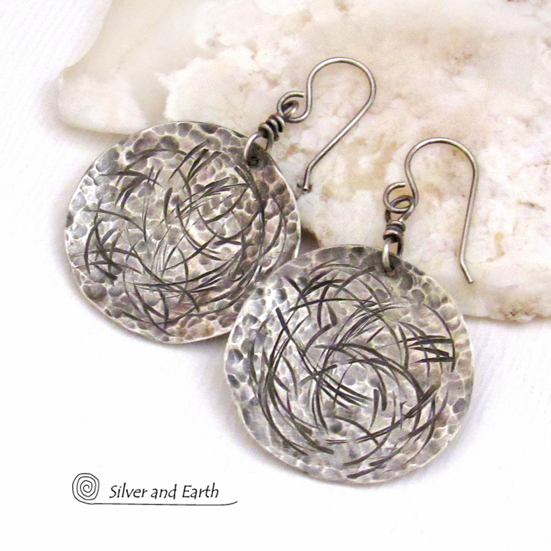These handcrafted sterling silver earrings have modern, contemporary style and are perfect for everyday wear -- they go with everything. They have a hammered and hand stamped abstract texture that was oxidized to highlight the details. Lightweight and comfortable to wear, they'll coordinate beautifully with all wardrobe styles.