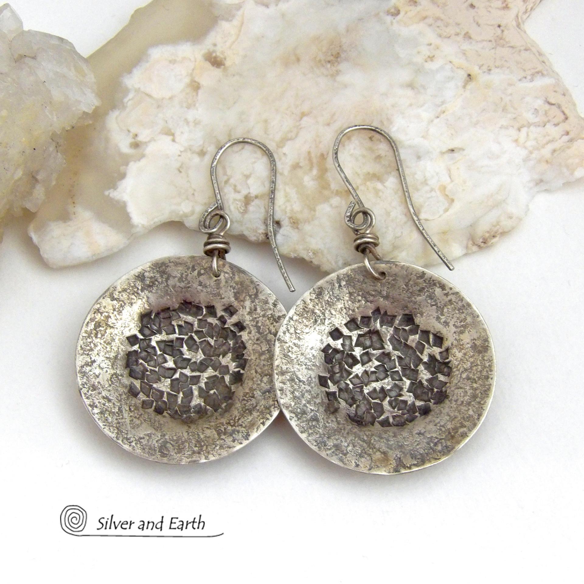 Bold, earthy and modern - these sterling silver dangle earrings are perfect for everyday wear. A classic staple for every jewelry lover's wardrobe - because they go with everything! Handcrafted entirely in solid sterling silver. I created the shapes out of sterling silver sheet; hammered and stamped the metal to create the rustic, organic texture; then oxidized them to enhance the detail. Handmade in the USA by Silver and Earth Jewelry.