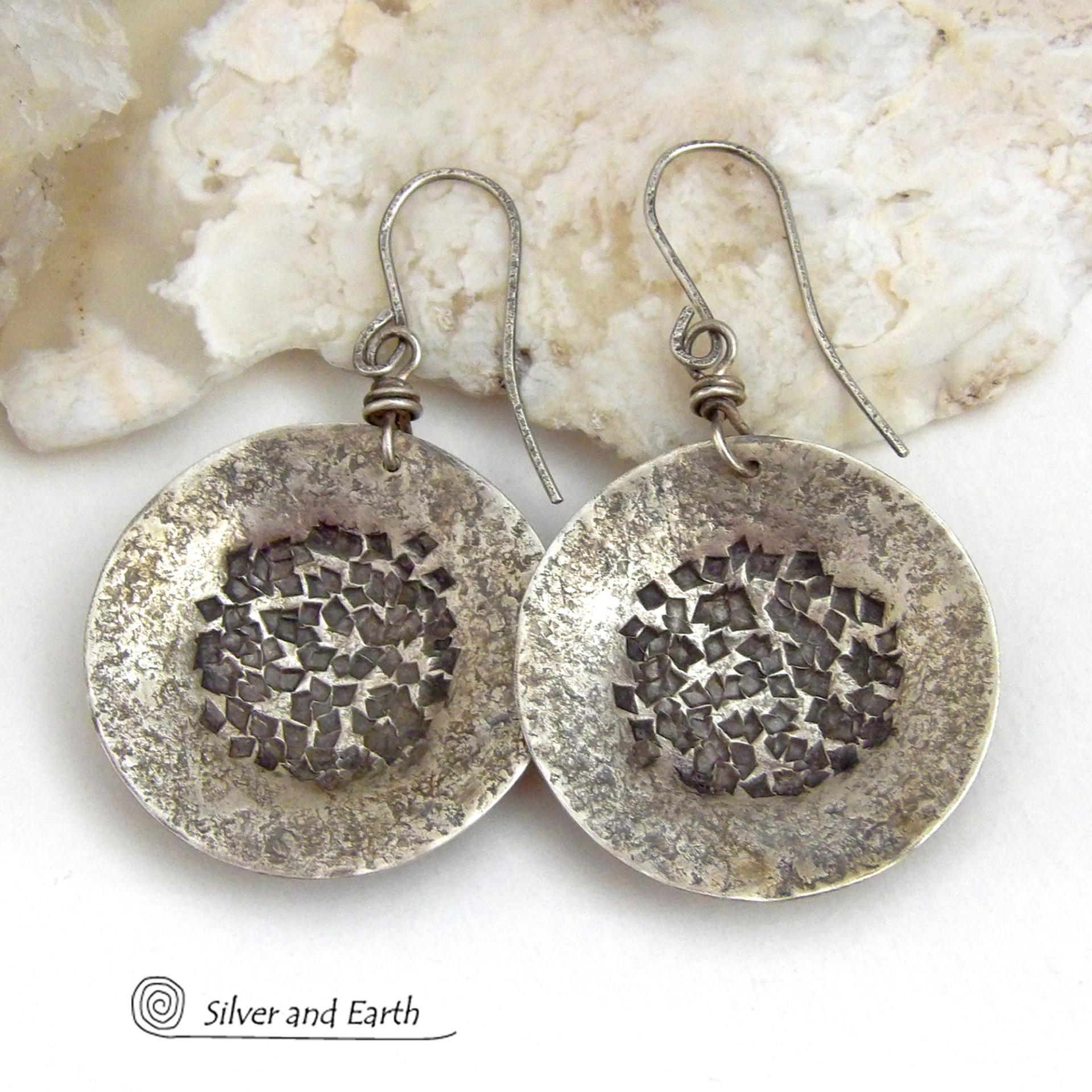 Bold, earthy and modern - these sterling silver dangle earrings are perfect for everyday wear. A classic staple for every jewelry lover's wardrobe - because they go with everything! Handcrafted entirely in solid sterling silver. I created the shapes out of sterling silver sheet; hammered and stamped the metal to create the rustic, organic texture; then oxidized them to enhance the detail. Handmade in the USA by Silver and Earth Jewelry.