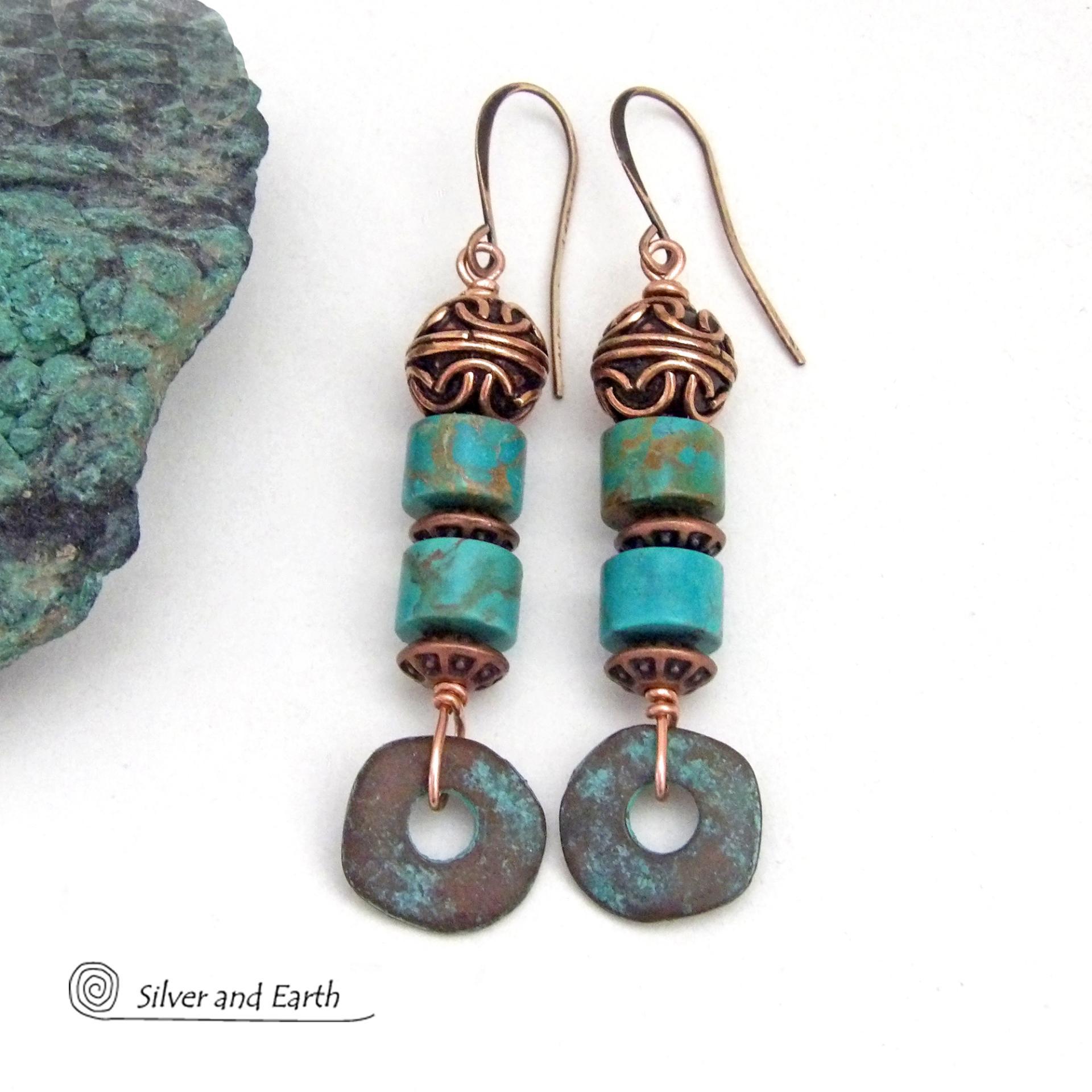 These handmade earrings feature natural turquoise stones accented with copper beads and organically shaped "rings" of copper with a soft turquoise patina finish. They have a modern chic bohemian style with a touch of exotic flair that makes a unique, bold statement. Handmade in the USA by Silver and Earth Jewelry.