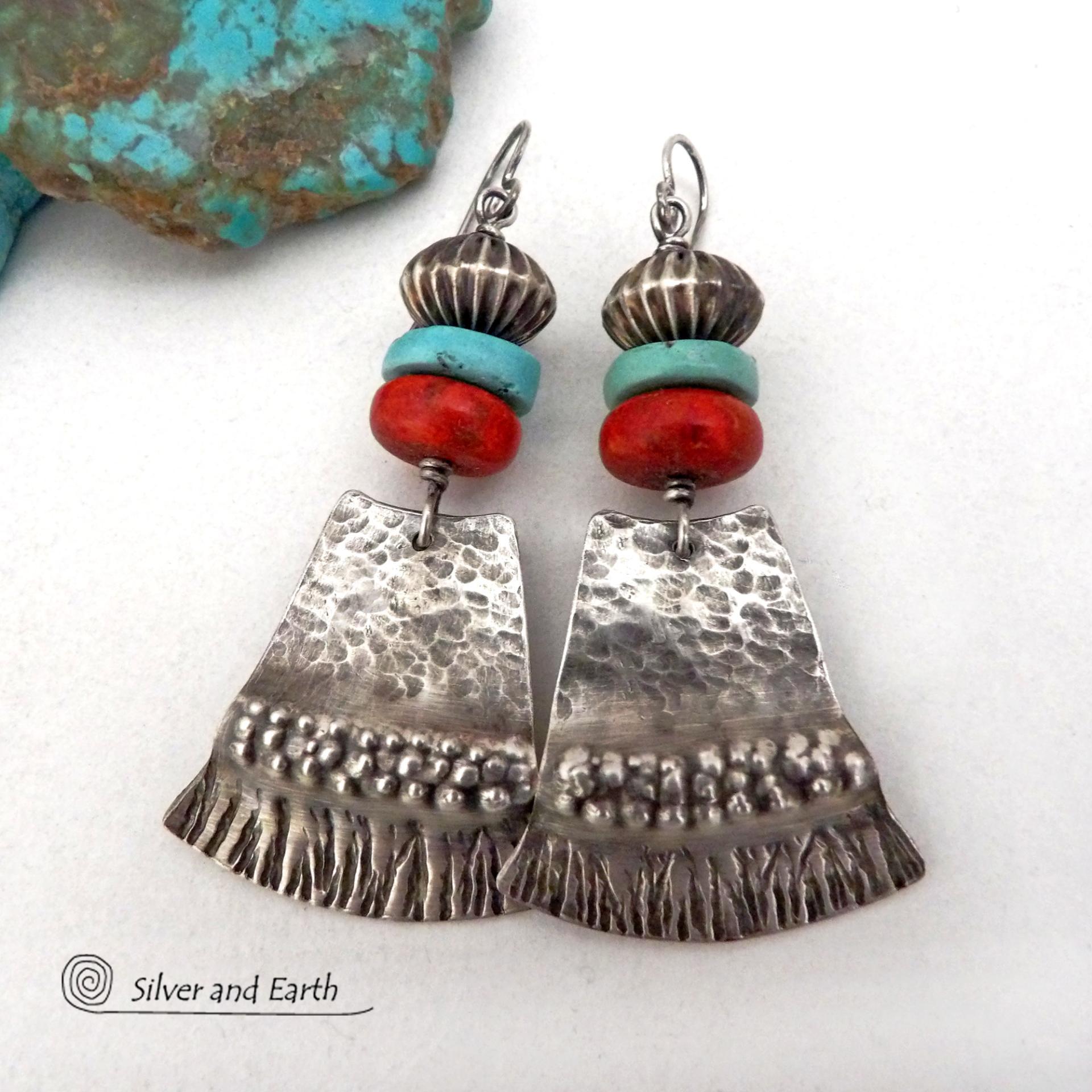 These handcrafted earrings feature hammered and hand stamped sterling silver dangles accented with a stack of natural turquoise stones, fossilized red coral and oxidized sterling silver Native style beads with a rich, corrugated texture. They have a modern, southwestern tribal flair that makes a bold statement. Perfect for women that love the Santa Fe southwest style.The earrings are handmade and are a beautiful example of southwest style jewelry. Handmade by Silver and Earth, a New Mexico True Certified b 