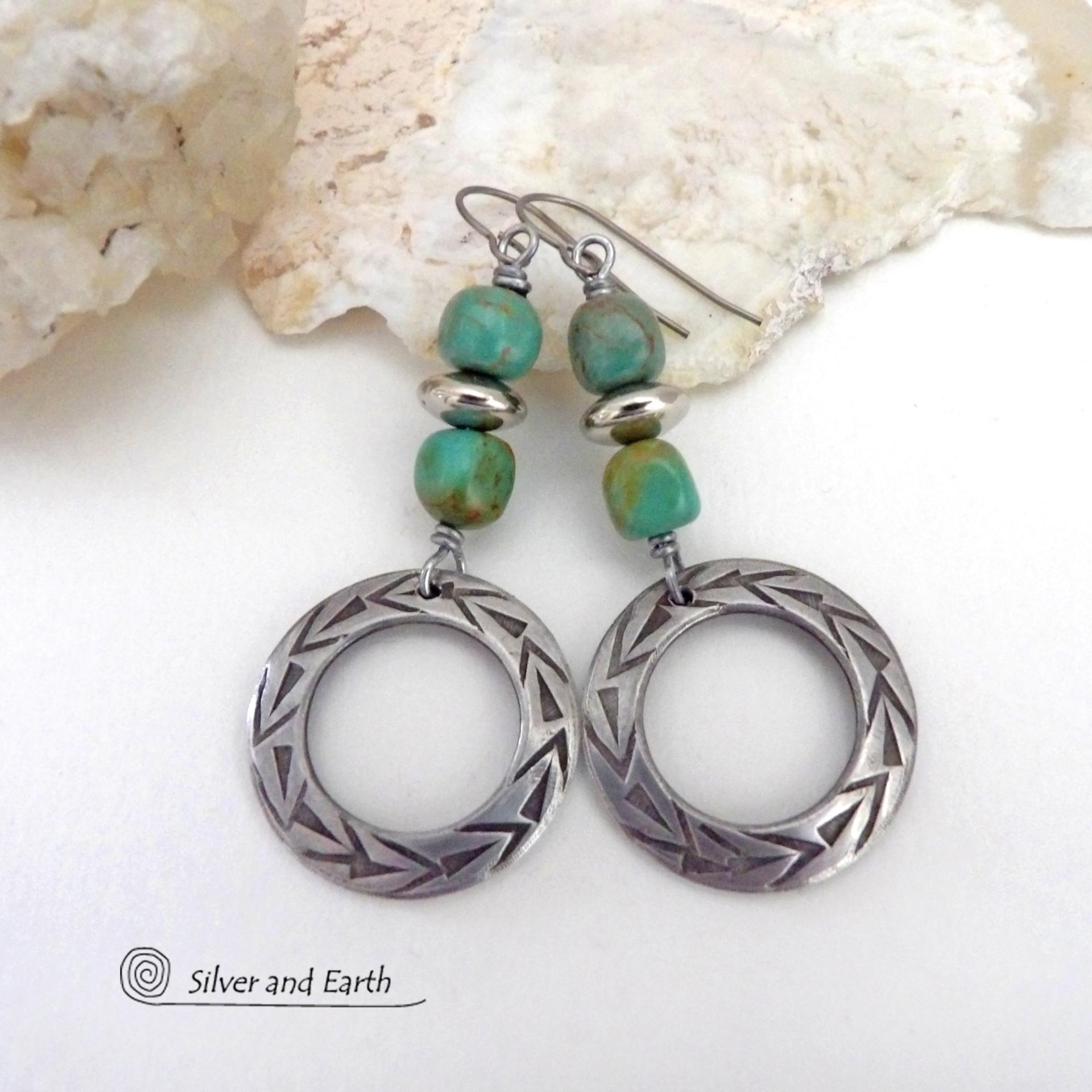 These handcrafted earrings feature silver pewter hoops with a hand stamped texture accented with natural, genuine turquoise stones and silver plated beads. Lightweight and comfortable to wear, they have an earthy modern style with southwest flair that coordinates beautifully with all wardrobe types. Handmade in the USA by Silver and Earth Jewelry, a Certified New Mexico True business.