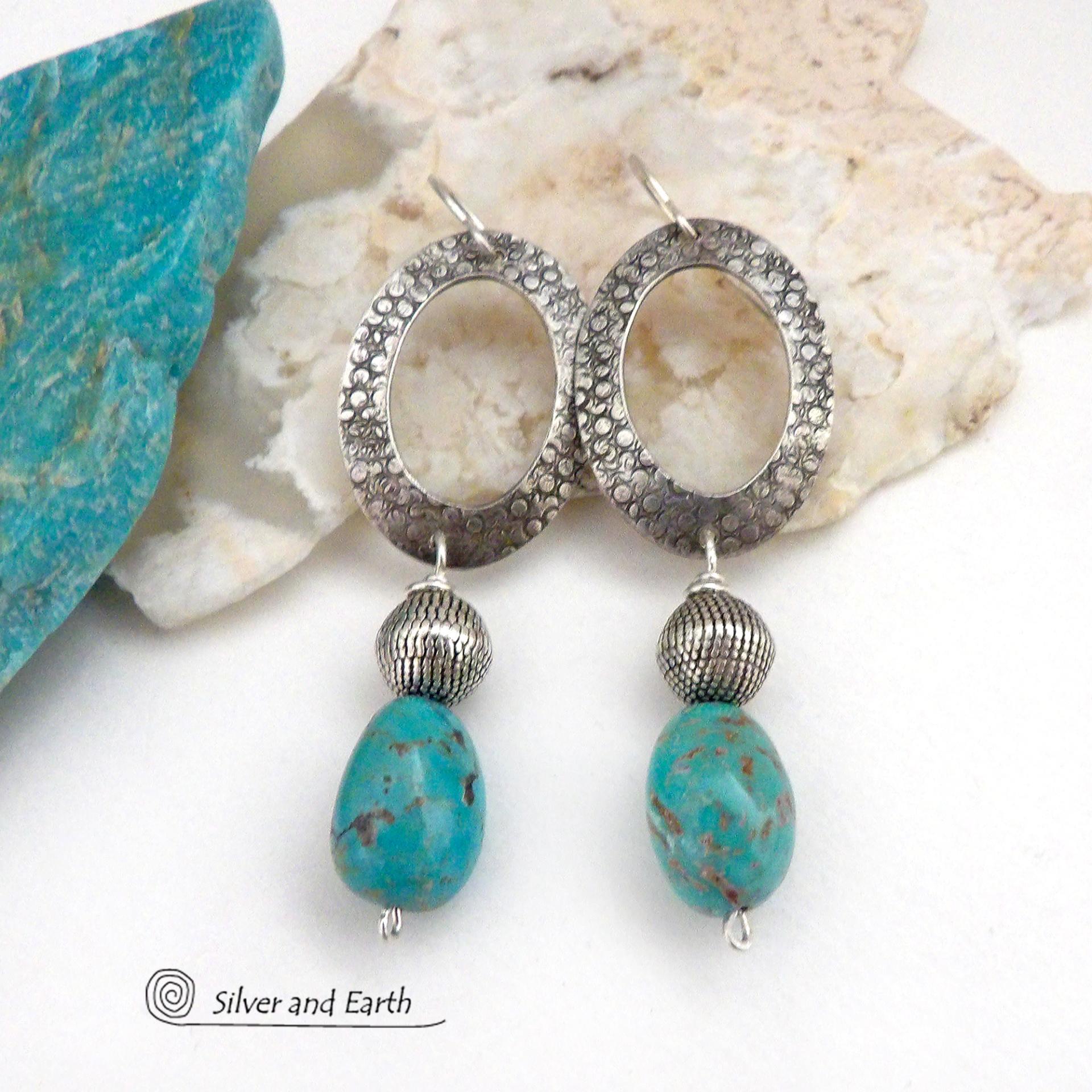 These handcrafted earrings feature hand stamped sterling silver oval hoops accented with natural turquoise stone nuggets and textured silver plated beads. They have a chic modern style with touch of southwestern flair that will coordinate beautifully with all wardrobe types. 