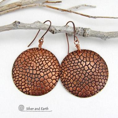 These handcrafted copper earrings have a beautifully detailed embossed cobblestone texture. Big and bold, they'll make a striking statement. Unique and versatile, they are lightweight and comfortable to wear and will look great with all wardrobe styles. Handmade in the USA by Silver and Earth Jewelry. Your choice of ear wire - copper or hypoallergenic niobium.