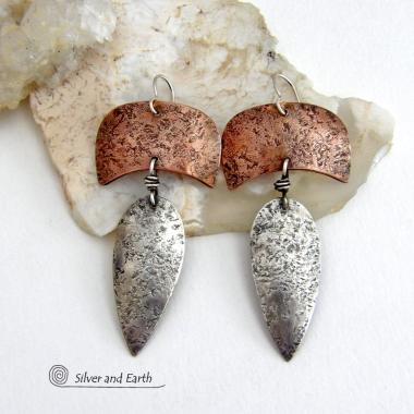 These handcrafted sterling silver and copper mixed metal earrings have an earthy, organic style with a modern tribal vibe. Unique and versatile, the combination of metals enables them to mix and match with other copper and silver accessories in your wardrobe. Handmade in the USA by Silver and Earth Jewelry.